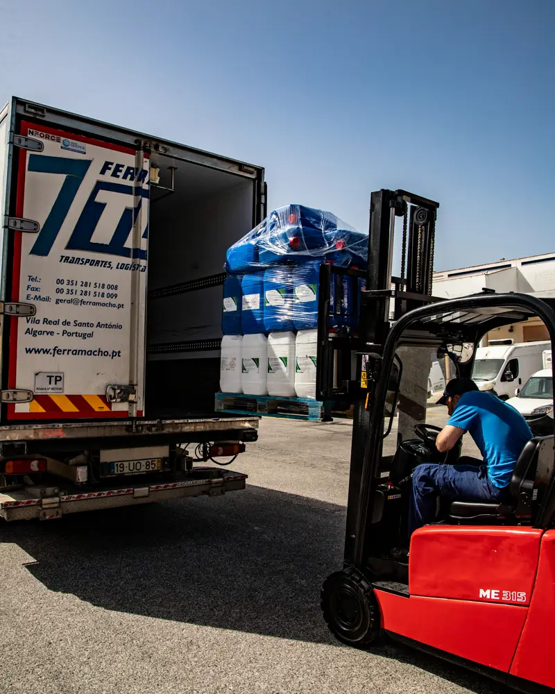 Forklift loading pallets onto a lorry, forklift battery supply Essex